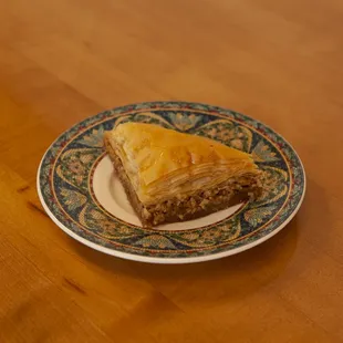 a piece of baklaa on a plate