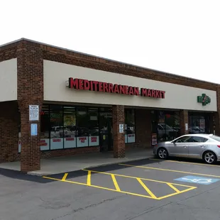 a car parked in front of the store