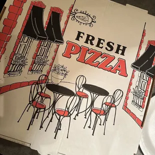 a slice of pizza on a paper plate