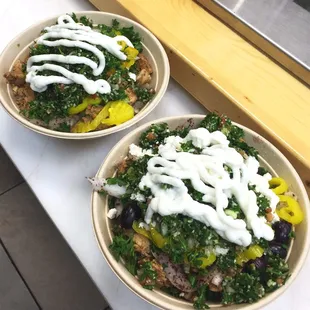 two bowls of food on a table