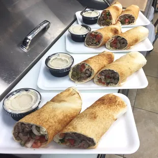 a variety of burritos and dips