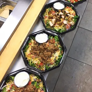 a row of plates of food