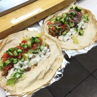 two tortillas with meat and vegetables