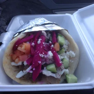 Lamb and beef gyro with schwarma toppings.