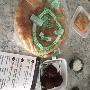 I bought s pack of pita wraps for only $3 and asked for my falafel on the side. Both were fresh and good.