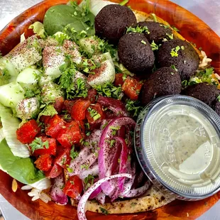 Falafel bowl served over rice pilaf