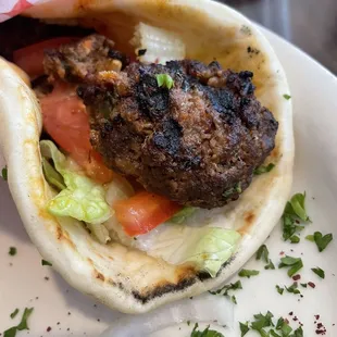 a pita sandwich on a plate
