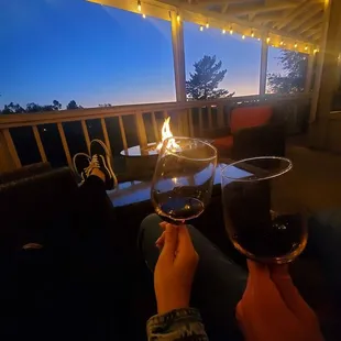 a person holding a glass of wine