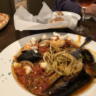 Seafood marina served over zucchini spaghetti