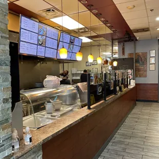 a view of a restaurant counter