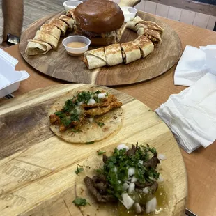 Chicken shawarma. Carne asada and chicken tacos, burger