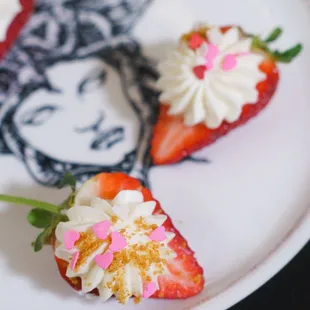 strawberries with whipped cream and sprinkles