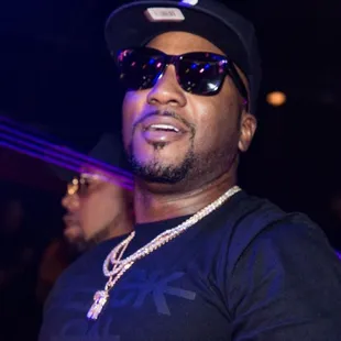 a man wearing sunglasses and a cap