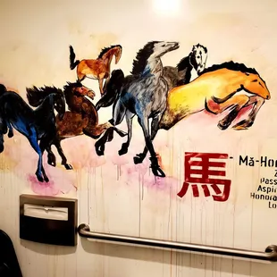 Cool Running Horses mural inside the Women's Restroom. Clean, nicely stocked and maintained.