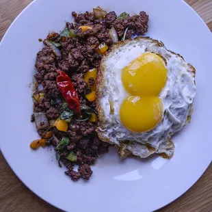 Krapow Wagyu beef with twin fried eggs.
