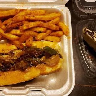 Philly Cheesesteak with Cajun fries and Oreo cheesecake. Oh yeah!!!