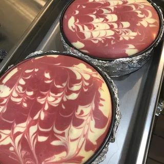 White Chocolate Raspberry Marble Cheesecake