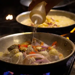 a frying pan filled with food