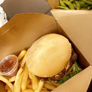 Burger and fries to go aswell as edamame $22