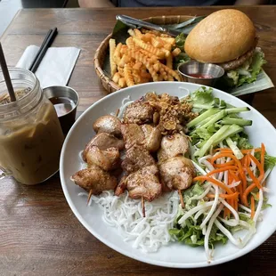 Grilled chicken satay bowl,  spring rolls, the double G chicken Banh Mi, Vietnamese coffee and the Thai iced tea