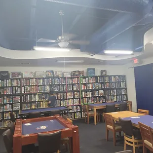 Lots of seating in the back area many more board games.