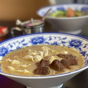 Build your own noodles: Chicken broth, chicken, sirloin, and rice noodles with lemon.