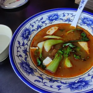 Tom Yum broth vs the bland broth they gave me