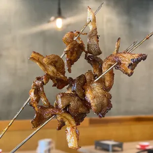 a skewer of meat on a stick