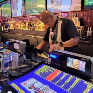 a man working at a bar