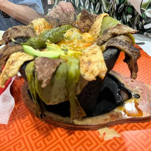 Sample platter ribs, skirt steak, chicken, cheese, shrimp, cactus leaves, onions