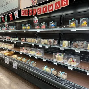 The refrigerated section where you can pick up a whole cake, cake slices, cupcakes, etc.