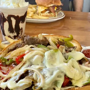 Huge Philly cheese steak sandwich, enough for 2