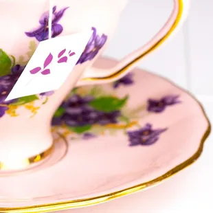 Small-batch tea blends available in loose-leaf and hand-pressed tea bag options.