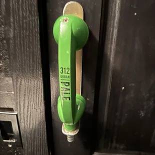 Door handle in women's restroom