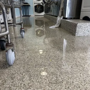 This is the HUGE PUDDLE from the water pouring out of the machine when i opened it.