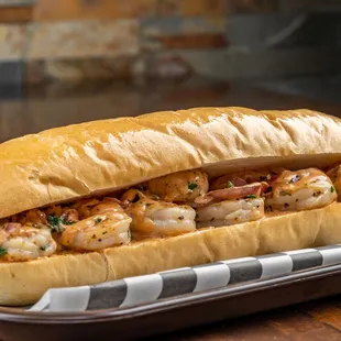 Shrimp Striker:
Grilled shrimp with our signature dressing, caramelized onions &amp; peppers, cilantro.