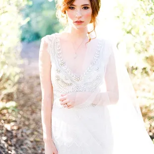 Styled by destination wedding planner Meggie Francisco, photographed by Callie Manion, gown by Anna Campbell, hair/makeup by Q the MUA.