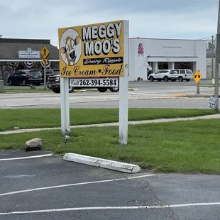 a sign in a parking lot