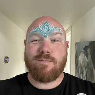 She even painted my face (the little ones at the party voted and I got an Elsa crown)