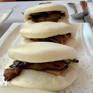 Steamed buns with crispy duck
