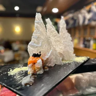 a plate of sushi on a table