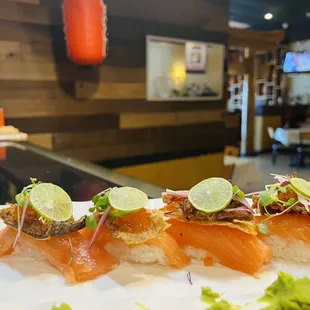a plate of sushi on a table