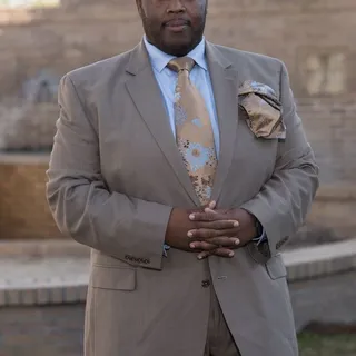 Travis B.