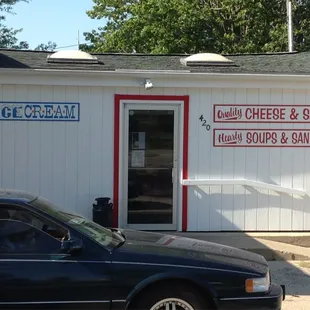 a car parked in front of a building