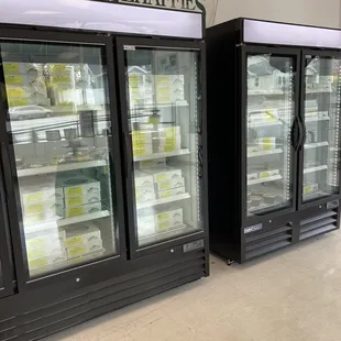 two refrigerators in a store