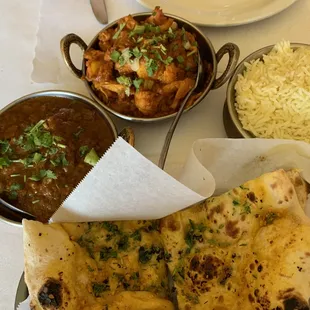 lamb mushroom curry, Aloo Gohbik, garlic naan