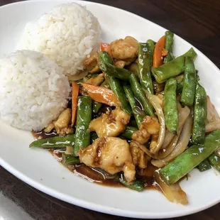 Chicken and green beans lunch combo. $10 for entree, rice, and soda. Good.