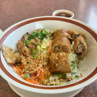 V5. Rolls and Chicken Over Vermicelli