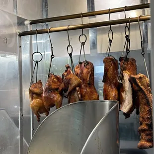 meat hanging from a rack