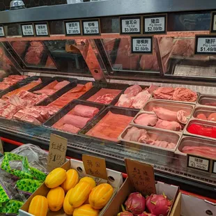 a display of meat and vegetables